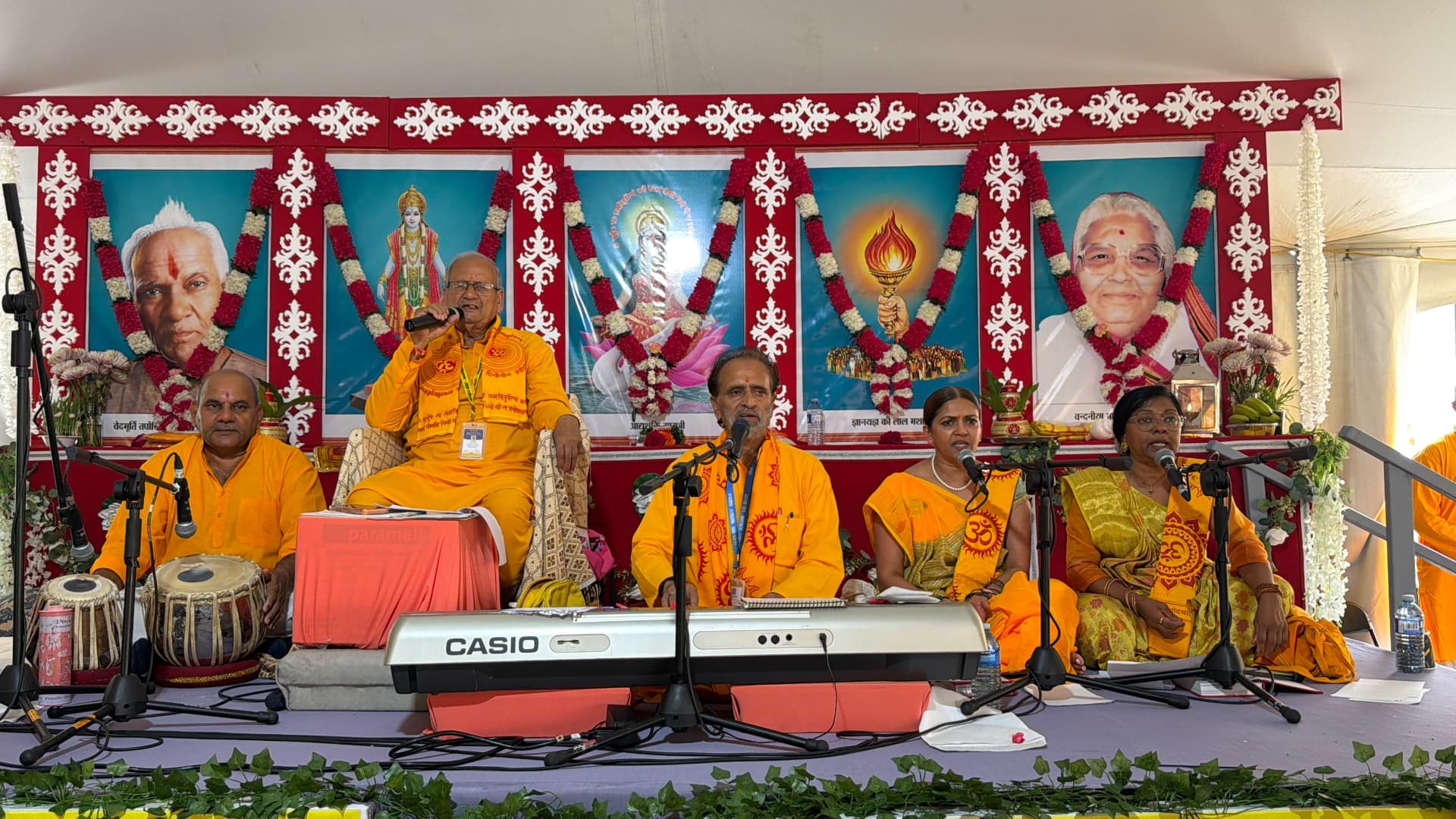 Musicians and singers performing bhajans on stage