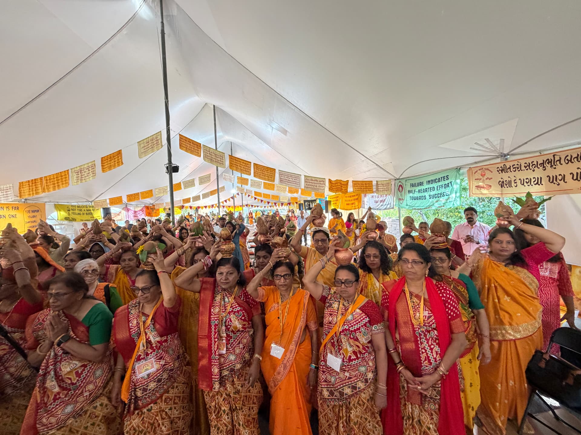 Women carrying kalash on their heads during the yatra