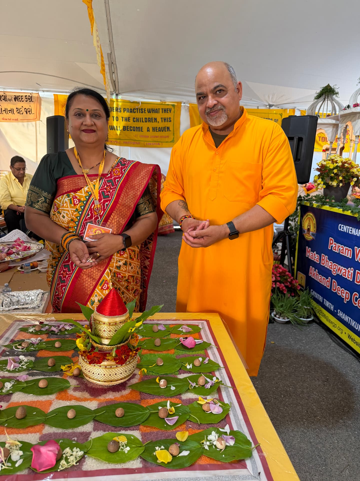 Sadhak couple performing the kalash puja under the pandal
