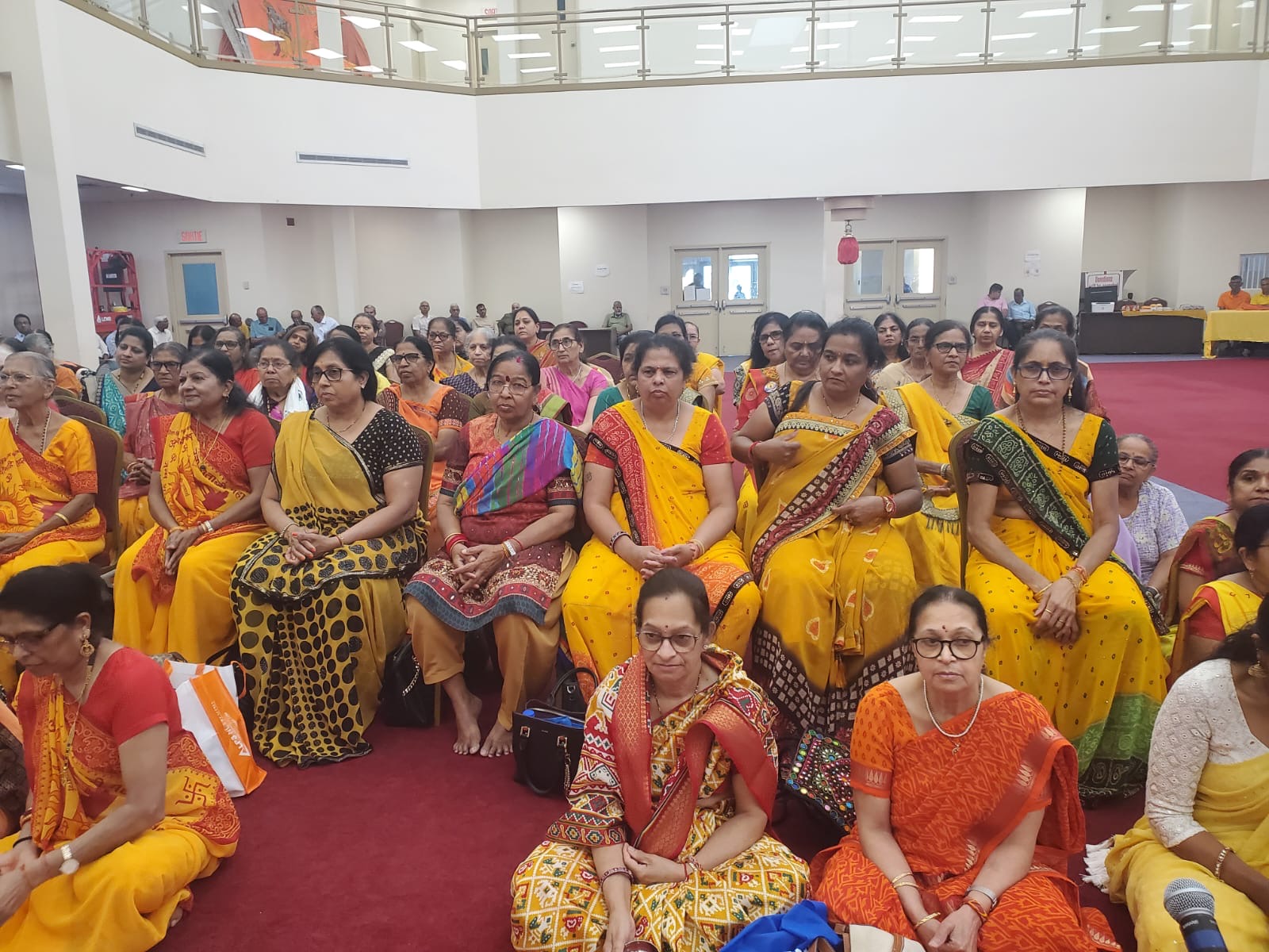 Devotees gathered in the mandir hall